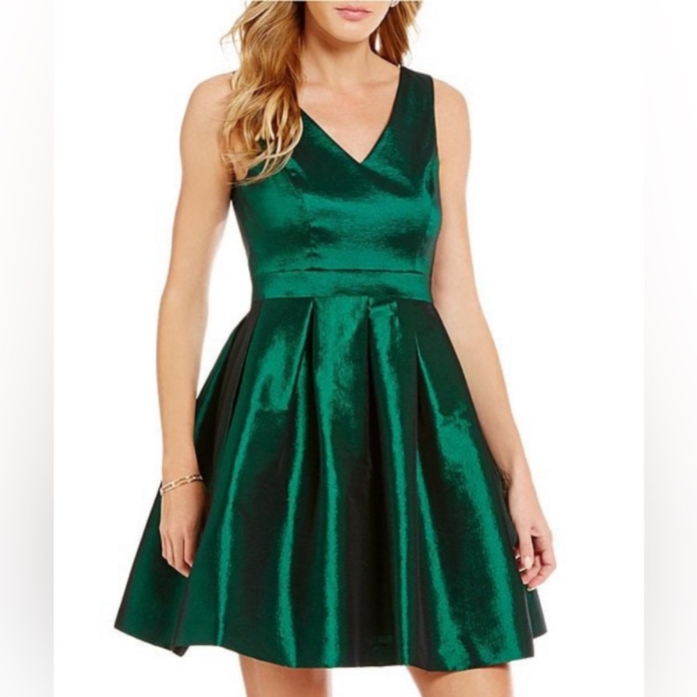 Gorgeous fit and flare dress with bow at the back